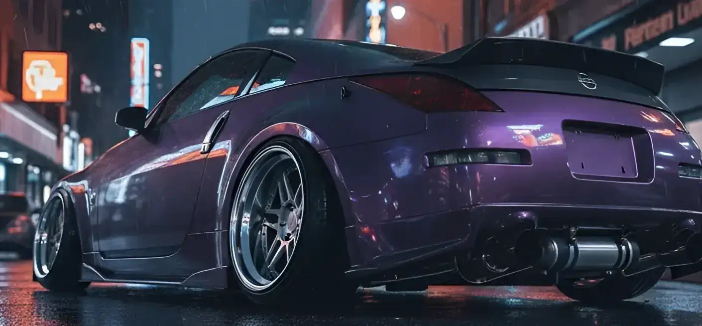 Purple nissan 350z with a sleek, glossy finish and custom alloy wheels.